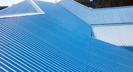Metal roof repair work in progress